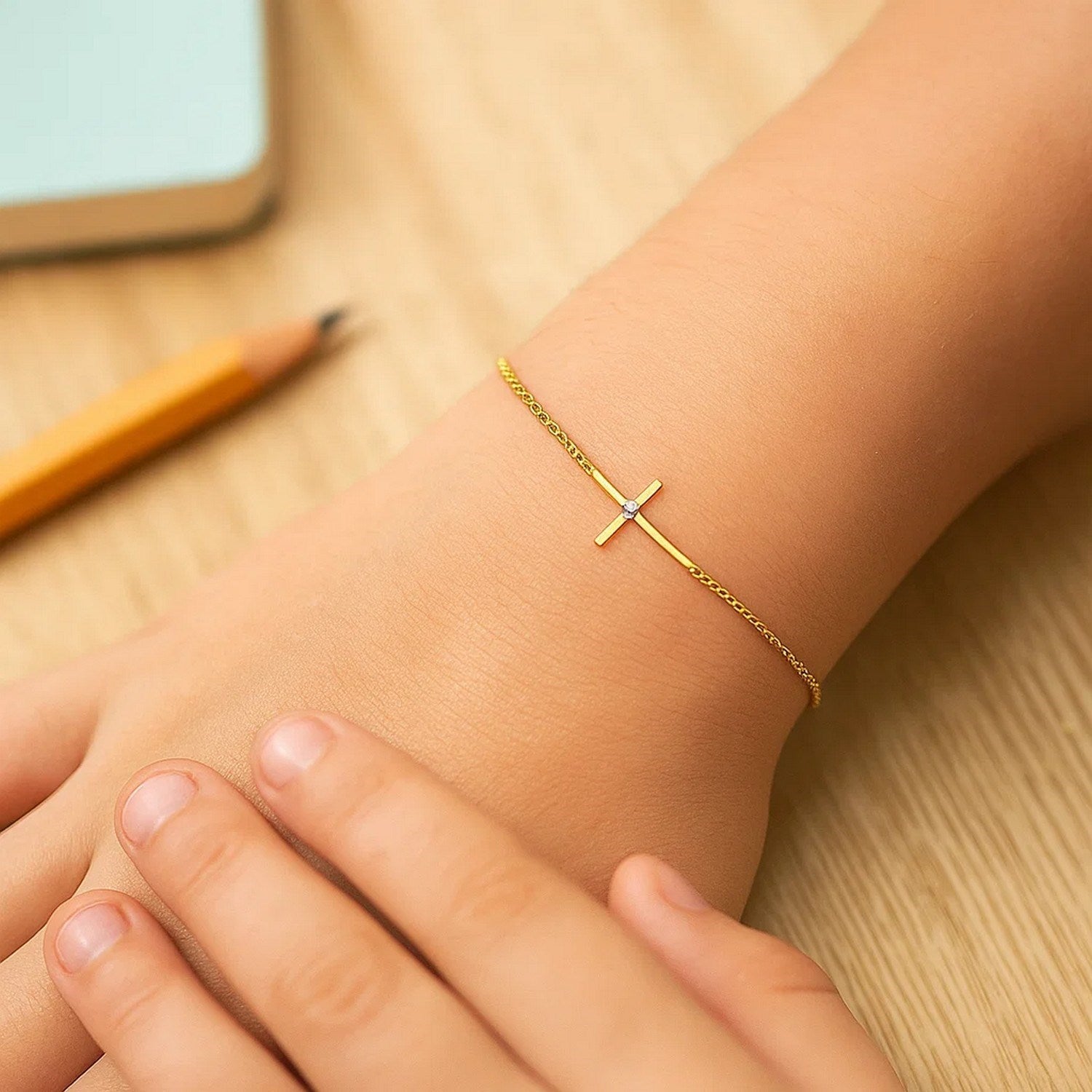 14k Yellow Gold 5 1/2 inch Childrens Bracelet with Cross (1.00 mm)