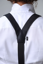 Elegant black ultra-fine virgin wool suspenders in editorial product shot